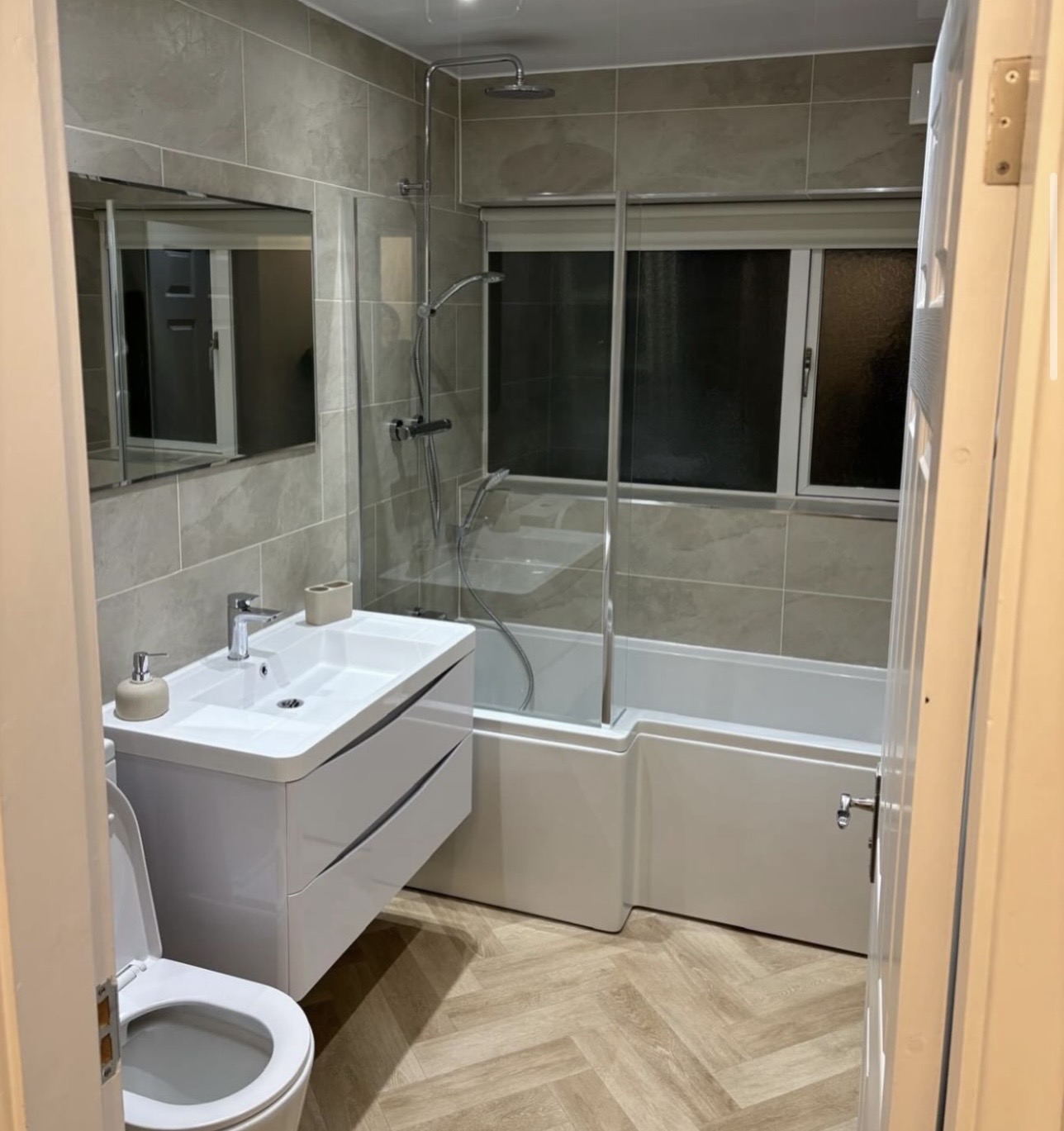 L-shape shower bath family suite — Nearby Birmingham project by M3 Trades