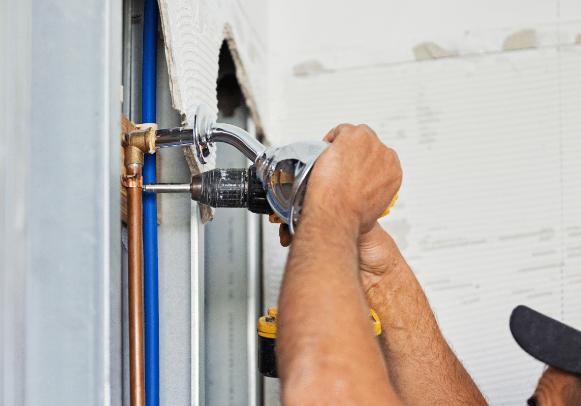 An M3 Trades plumber carrying out emergency repairs in a bathroom